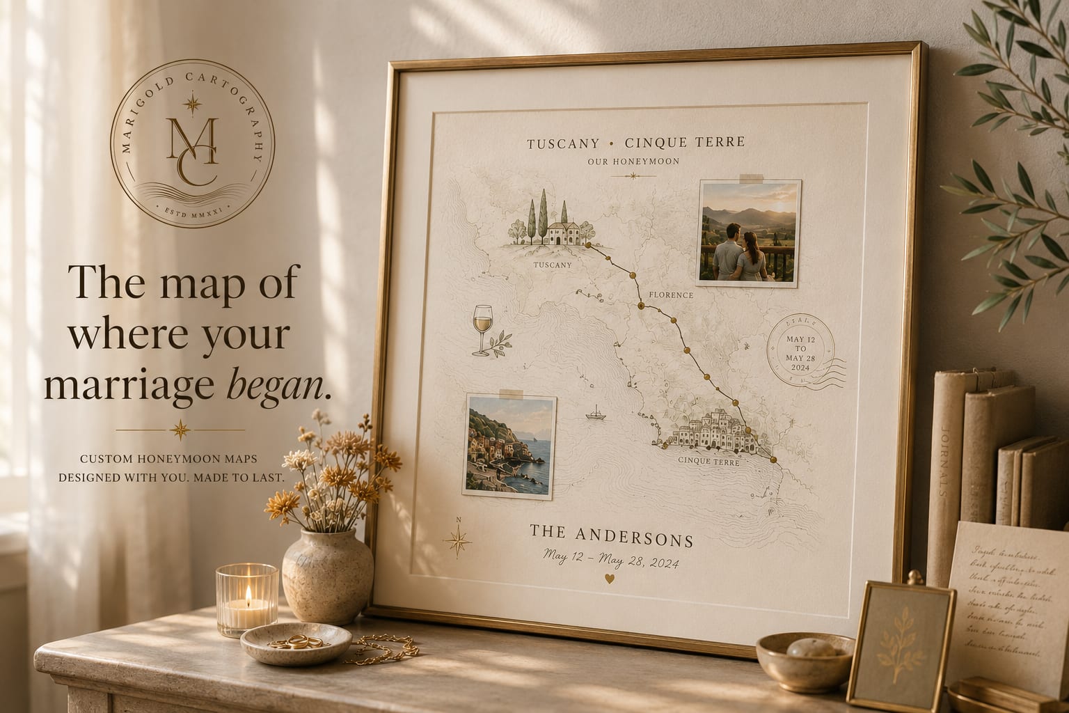 A framed Marigold Cartography honeymoon print — a custom illustrated map of Tuscany and Cinque Terre with the couple's route, photos, and names — styled on a console table